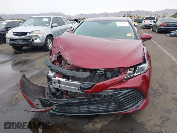 2020 Toyota Camry LE with VIN 4T1C11AK0LU954420, listed as a IAAI auction lot 41576657 with 56,863 mi miles. Bid and sale history available at carsss.com. Image 12.