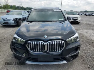 2020 BMW X1 xDrive28i z VIN WBXJG9C08L5P21466, wystawiony jako Copart lot #61664675 z przebiegiem 54 176 mil mil oraz Szkoda całkowita • Salvage title. Historia ofert i sprzedaży dostępna na DreamBid. Obrazek 5.