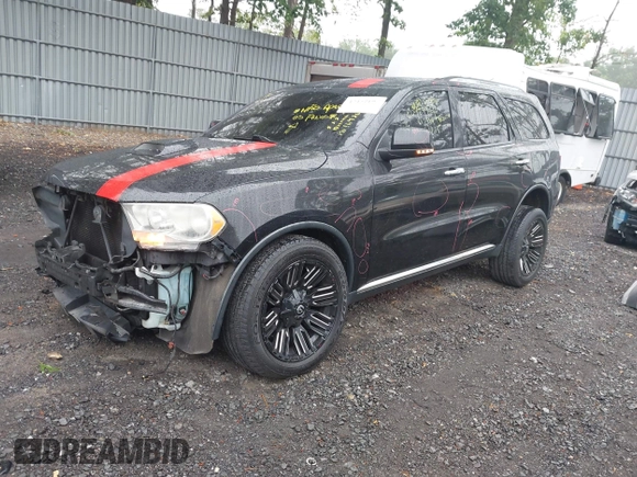 2013 Dodge Durango Crew with VIN 1C4RDJDG8DC675527, listed as a IAAI auction lot 42452197 with 184,981 mi miles and . Bid and sale history available at DreamBid. Image 2.