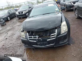 2013 Cadillac CTS Luxury z VIN 1G6DG5E52D0111849, wystawiony jako IAAI lot #42130235 z przebiegiem 129 993 mil mil oraz . Historia ofert i sprzedaży dostępna na DreamBid. Obrazek 12.