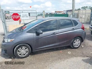 2015 Honda Fit LX with VIN 3HGGK5H5XFM744332, listed as a IAAI auction lot 42149999 with 91,101 mi miles. Bid and sale history available at carsss.com. Image 14.
