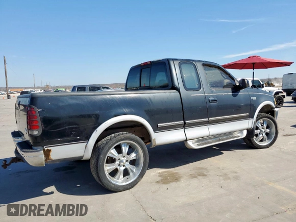 1997 Ford F-150 XL with VIN 1FTDX1861VKB58404, listed as a Copart auction lot 47243215 with 167,793 mi miles and Clean Title. Bid and sale history available at carsss.com. Image 3.