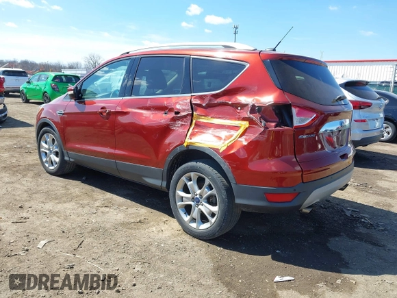 2016 Ford Escape Titanium with VIN 1FMCU0JX6GUC37684, listed as a IAAI auction lot 41829191 with 88,032 mi miles. Bid and sale history available at carsss.com. Image 3.