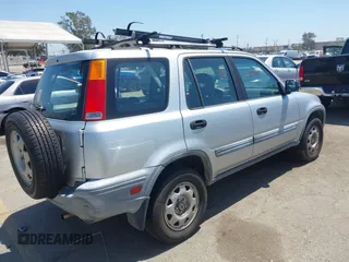 1999 Honda CR-V LX with VIN JHLRD2847XC000944, listed as a IAAI auction lot 42082593 with 198,474 mi miles. Bid and sale history available at carsss.com. Image 4.