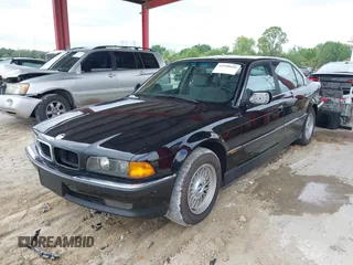 1997 BMW 7 Series 740il with VIN WBAGJ8324VDL43320, listed as a IAAI auction lot 41990660 with 193,998 mi miles. Bid and sale history available at carsss.com. Image 2.
