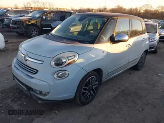 2015 FIAT 500L Lounge with VIN ZFBCFACH8FZ031314, listed as a IAAI auction lot 41392026 with 184,145 mi miles. Bid and sale history available at carsss.com. Image 2.