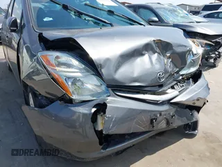 2007 Toyota Prius z VIN JTDKB20U173242693, wystawiony jako IAAI lot #42310546 z przebiegiem 250 887 mil mil oraz . Historia ofert i sprzedaży dostępna na DreamBid. Obrazek 6.