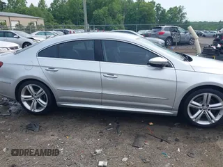 2014 Volkswagen CC Sport z VIN WVWBN7AN9EE524674, wystawiony jako IAAI lot #42252264 z przebiegiem 118 378 mil mil oraz . Historia ofert i sprzedaży dostępna na DreamBid. Obrazek 13.