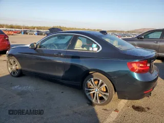 2015 BMW 2 Series 228i xDrive with VIN WBA1F7C50FVX95823, listed as a Copart auction lot 87157134 with 55,312 mi miles and Salvage Title. Bid and sale history available at carsss.com. Image 2.