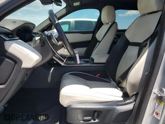 2018 Land Rover Range Rover Velar R-Dynamic SE с VIN SALYL2RV0JA747591, выставлен на аукционе Copart как лот 60323425 с пробегом 87 357 миль миль и Чистый • Clean title. История ставок и продаж доступна на DreamBid. Изображение 7.
