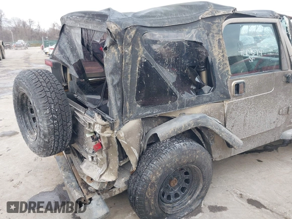 2003 Jeep Wrangler X with VIN 1J4FA39SX3P329386, listed as a IAAI auction lot 41407594 with 140,390 mi miles. Bid and sale history available at carsss.com. Image 13.