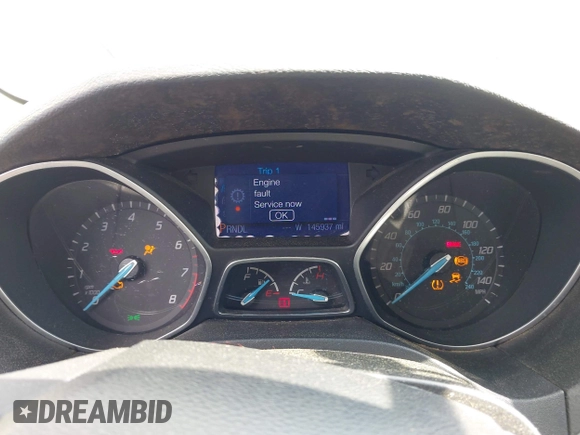 2013 Ford Focus SE z VIN 1FADP3F22DL216627, wystawiony jako IAAI lot #42263314 z przebiegiem 145 937 mil mil oraz . Historia ofert i sprzedaży dostępna na DreamBid. Obrazek 7.