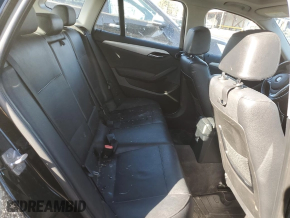 2015 BMW X1 xDrive28i with VIN WBAVL1C50FVY25782, listed as a Copart auction lot 42871465 with 116,084 mi miles and Salvage Title. Bid and sale history available at carsss.com. Image 11.