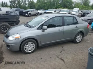 2011 Nissan Versa S with VIN 3N1BC1AP8BL409180, listed as a Copart auction lot 59702675 with 54,829 mi miles and Salvage title. Bid and sale history available at DreamBid. Image 1.