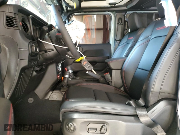 2024 Jeep Wrangler Rubicon X with VIN 1C4RJXFG5RW287542, listed as a Copart auction lot 72682924 with 5,792 mi miles and Salvage title. Bid and sale history available at DreamBid. Image 7.