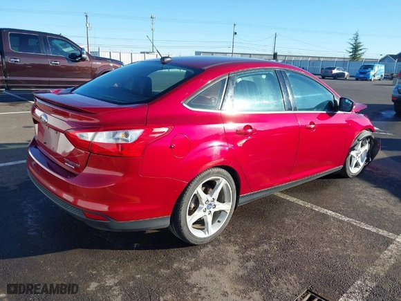 2014 Ford Focus Titanium with VIN 1FADP3J23EL137525, listed as a IAAI auction lot 41562684 with 127,104 mi miles. Bid and sale history available at carsss.com. Image 4.