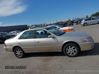 2000 Toyota Camry LE z VIN JT2BF22K5Y0258522, wystawiony jako IAAI lot #41998874 z przebiegiem 300 186 mil mil oraz . Historia ofert i sprzedaży dostępna na DreamBid. Obrazek 13.