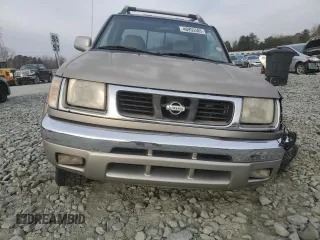 2000 Nissan Frontier XE with VIN 1N6ED27Y3YC366060, listed as a Copart auction lot 48955585 with 158,565 mi miles and Salvage title. Bid and sale history available at DreamBid. Image 5.