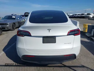 2022 Tesla Model Y Long Range z VIN 7SAYGDEE8NF374636, wystawiony jako IAAI lot #41545669 z przebiegiem 41 965 mil mil oraz . Historia ofert i sprzedaży dostępna na DreamBid. Obrazek 16.