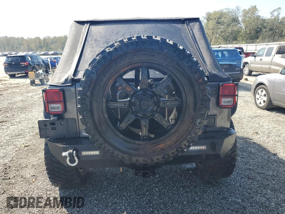 2018 Jeep Wrangler JK Unlimited Sport S with VIN 1C4BJWDG0JL842059, listed as a Copart auction lot 74382094 with 63,373 mi miles and Salvage Title. Bid and sale history available at carsss.com. Image 6.