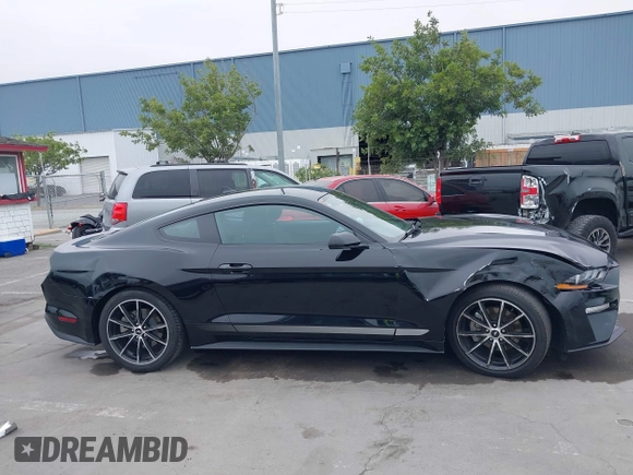 2022 Ford Mustang EcoBoost with VIN 1FA6P8THXN5145312, listed as a IAAI auction lot 42075186 with 28,233 mi miles and . Bid and sale history available at DreamBid. Image 14.
