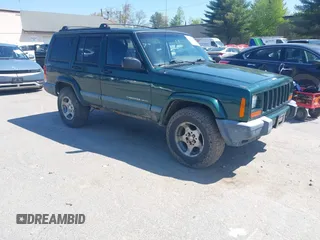 2000 Jeep Cherokee z VIN 1J4FF48S2YL253251, wystawiony jako IAAI lot #42243268 z przebiegiem 154 136 mil mil oraz . Historia ofert i sprzedaży dostępna na DreamBid. Obrazek 1.