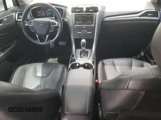 2016 Ford Fusion Titanium z VIN 3FA6P0D94GR181179, wystawiony jako Copart lot #56987005 z przebiegiem 79 841 mil mil oraz Czysty tytuł • Clean title. Historia ofert i sprzedaży dostępna na DreamBid. Obrazek 8.