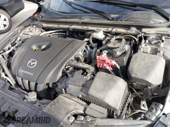 2021 Mazda 3 Premium with VIN JM1BPAML2M1310374, listed as a IAAI auction lot 41190608 with 97,648 mi miles and . Bid and sale history available at DreamBid. Image 10.