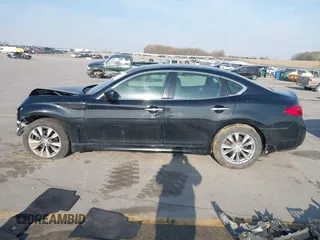 2013 Infiniti M with VIN JN1BY1AR3DM600436, listed as a IAAI auction lot 42031696 with 114,637 mi miles and . Bid and sale history available at DreamBid. Image 14.