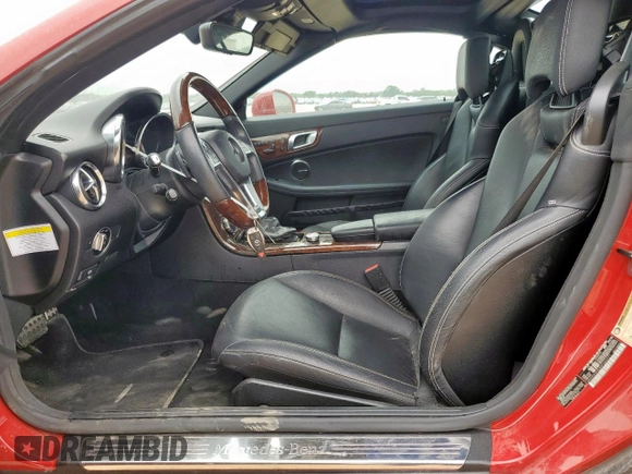 2013 Mercedes-Benz SLK 250 with VIN WDDPK4HA4DF063771, listed as a Copart auction lot 55578295 with 64,339 mi miles and Salvage title. Bid and sale history available at DreamBid. Image 7.