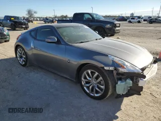 2014 Nissan 370Z Nismo with VIN JN1AZ4EH6EM633797, listed as a Copart auction lot 87879675 with 21,410 mi miles and Salvage Title. Bid and sale history available at DreamBid. Image 4.