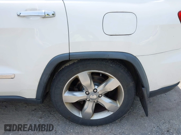 2011 Jeep Grand Cherokee Overland with VIN 1J4RR6GG3BC587857, listed as a IAAI auction lot 42879845 with 165,572 mi miles and . Bid and sale history available at DreamBid. Image 6.