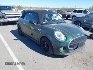 2016 MINI Convertible z VIN WMWWG5C51G3C19231, wystawiony jako IAAI lot #41805261 z przebiegiem 93 573 mil mil oraz . Historia ofert i sprzedaży dostępna na DreamBid. Obrazek 1.