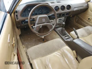 1982 Datsun 280ZX 2+2 z VIN JN1HZ06S8CX435431, wystawiony jako Copart lot #44468595 z przebiegiem 41 956 mil mil oraz Tytuł czysty. Historia ofert i sprzedaży dostępna na DreamBid. Obrazek 8.