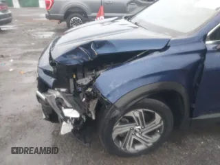 2022 Hyundai Santa Fe SE z VIN 5NMS14AJ8NH406846, wystawiony jako IAAI lot #41588202 z przebiegiem 34 006 mil mil oraz . Historia ofert i sprzedaży dostępna na DreamBid. Obrazek 17.