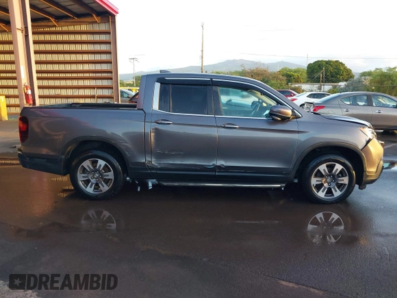2019 Honda Ridgeline RTL-T z VIN 5FPYK2F67KB001839, wystawiony jako IAAI lot #41655998 z przebiegiem 82 578 mil mil oraz . Historia ofert i sprzedaży dostępna na DreamBid. Obrazek 14.