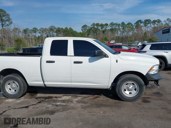 2018 Ram 1500 Tradesman with VIN 1C6RR6FG6JS347673, listed as a IAAI auction lot 41692169 with 121,631 mi miles and . Bid and sale history available at DreamBid. Image 13.