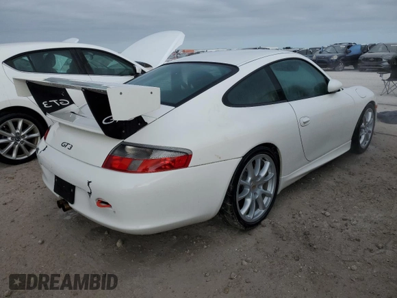 2004 Porsche 911 z VIN WP0AC29984S692205, wystawiony jako Copart lot #73920204 z przebiegiem Nie podano mil oraz Nie do naprawy • Non repairable. Historia ofert i sprzedaży dostępna na DreamBid. Obrazek 3.