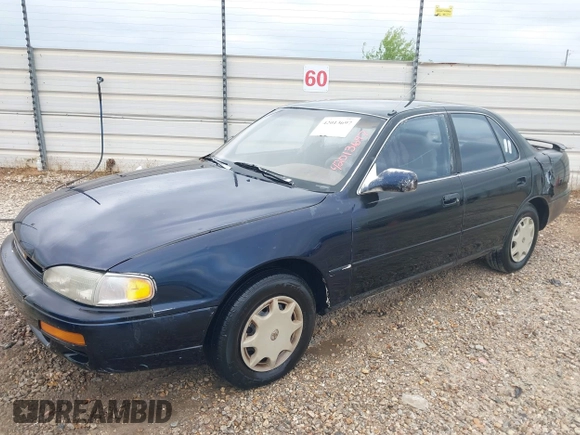 1996 Toyota Camry DX with VIN 4T1BG12K6TU754392, listed as a IAAI auction lot 42013697 with 172,410 mi miles. Bid and sale history available at carsss.com. Image 2.