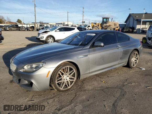 2015 BMW 6 Series 650i with VIN WBAYM9C53FD248356, listed as a Copart auction lot 85499554 with 115,292 mi miles and Salvage Title. Bid and sale history available at DreamBid. Image 1.