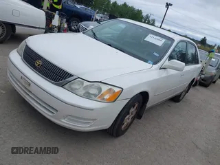 2002 Toyota Avalon XL with VIN 4T1BF28B82U239876, listed as a IAAI auction lot 42142686 with 104,163 mi miles and . Bid and sale history available at DreamBid. Image 2.