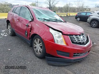 2015 Cadillac SRX Luxury Collection z VIN 3GYFNBE35FS574812, wystawiony jako IAAI lot #42037577 z przebiegiem 94 727 mil mil oraz . Historia ofert i sprzedaży dostępna na DreamBid. Obrazek 1.