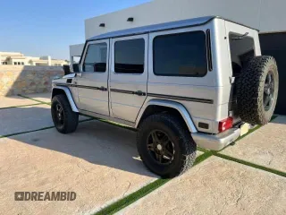 2002 Mercedes-Benz G-Class with VIN WDCYR49EX2X128555, listed as a Copart auction lot 77047164 with 222,979 mi miles and Salvage Title. Bid and sale history available at carsss.com. Image 3.