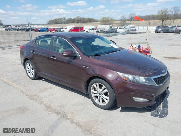 2011 Kia Optima EX with VIN KNAGN4A7XB5055304, listed as a IAAI auction lot 42023759 with 158,385 mi miles. Bid and sale history available at carsss.com. Image 1.