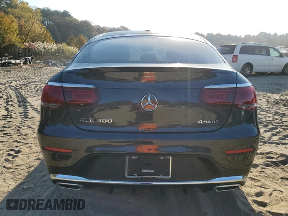 2021 Mercedes-Benz GLC with VIN W1N0J8EB8MF891527, listed as a Copart auction lot 77092154 with 31,496 mi miles and Salvage Title. Bid and sale history available at carsss.com. Image 6.