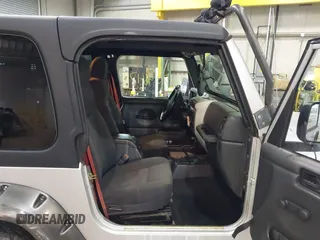 2003 Jeep Wrangler Rubicon with VIN 1J4FA69S13P375142, listed as a IAAI auction lot 41709647 with 125,443 mi miles and . Bid and sale history available at DreamBid. Image 5.