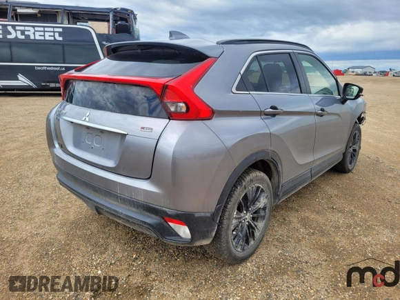 2020 Mitsubishi Eclipse Cross LE z VIN JA4AT4AA3LZ609491, wystawiony jako Copart lot #59165484 z przebiegiem 66 586 mil mil oraz Szkoda całkowita • Salvage title. Historia ofert i sprzedaży dostępna na DreamBid. Obrazek 3.