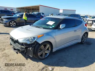 2013 Hyundai Veloster Turbo with VIN KMHTC6AE6DU162372, listed as a IAAI auction lot 41481820 with 105,650 mi miles and . Bid and sale history available at DreamBid. Image 17.