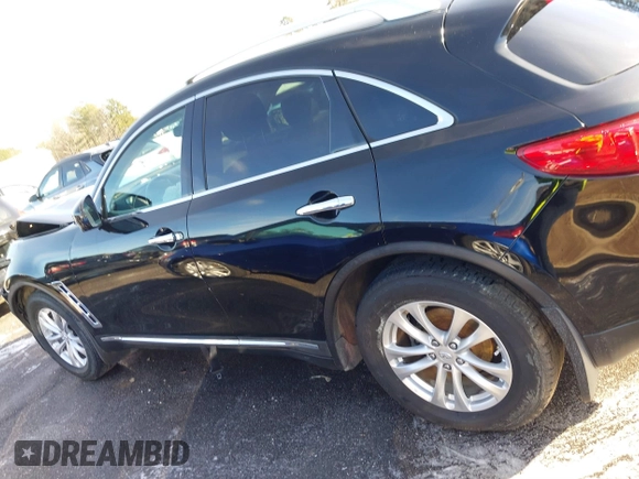 2013 Infiniti FX z VIN JN8CS1MUXDM140215, wystawiony jako IAAI lot #41271039 z przebiegiem 134 887 mil mil oraz . Historia ofert i sprzedaży dostępna na DreamBid. Obrazek 14.