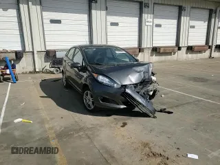 2019 Ford Fiesta SE z VIN 3FADP4BJ5KM146863, wystawiony jako Copart lot #52404965 z przebiegiem 61 286 mil mil oraz Szkoda całkowita • Salvage title. Historia ofert i sprzedaży dostępna na DreamBid. Obrazek 10.